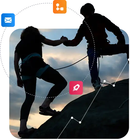 Dos escaladors ajudant-se al cim, simbolitzant la col·laboració al programa de Partners de Lleida.net